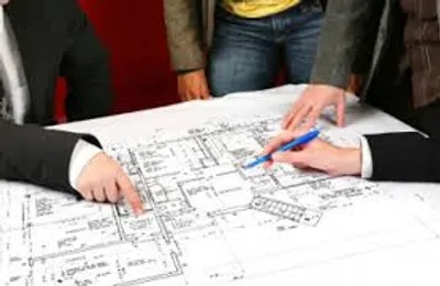 contractors looking at design plans